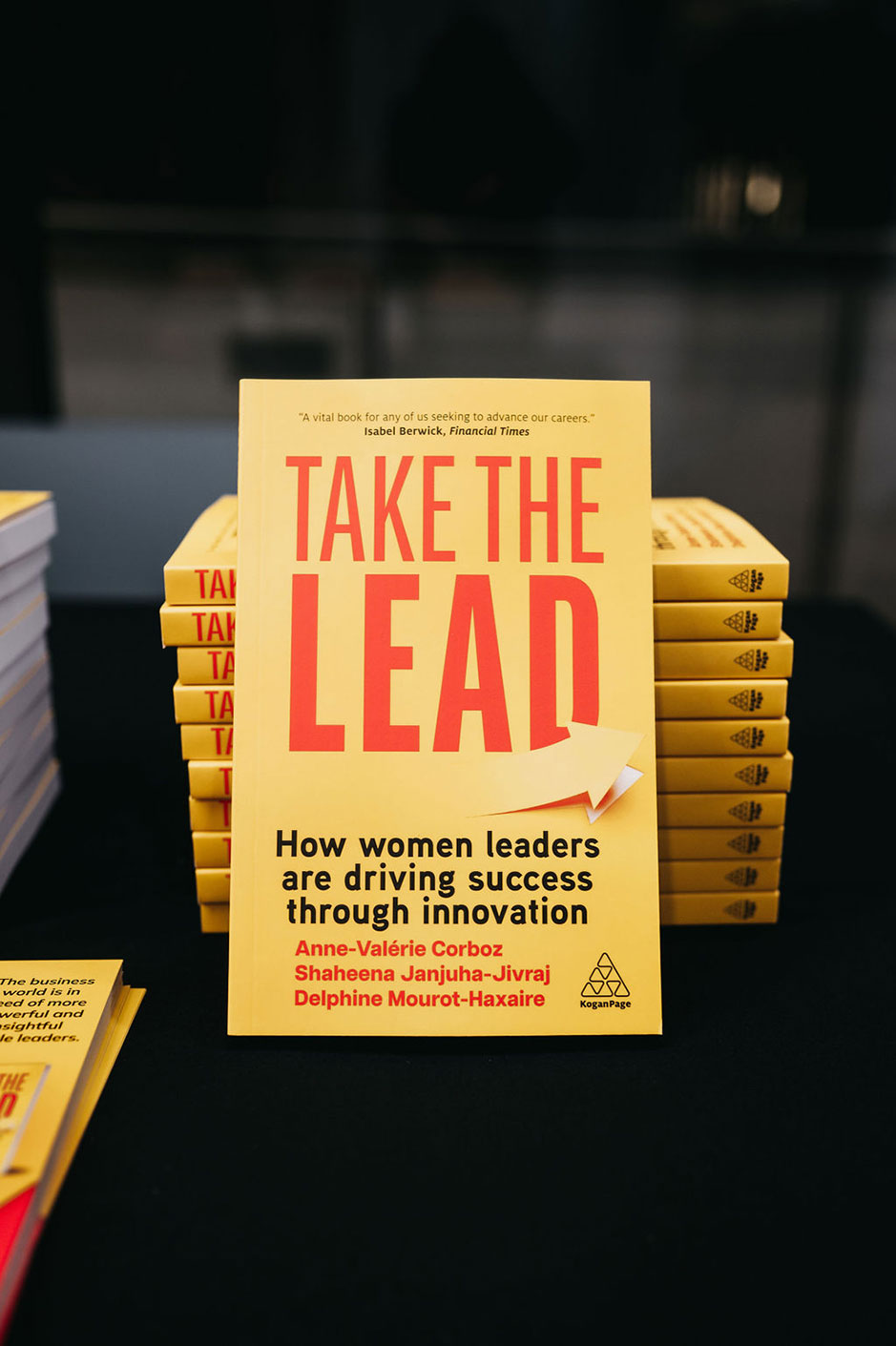 The cover of a book titled "Take the Lead: How Women Leaders are Driving Success Through Innovation" by Anne-Valérie Corboz, Shaheena Janjuha-Jivraj, and Delphine Mourot-Naxaire