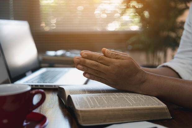 praying at work_123rf